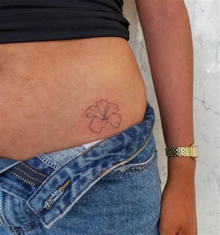 Embrace Your Style: The Allure of Small Flower Tattoos on the Hip