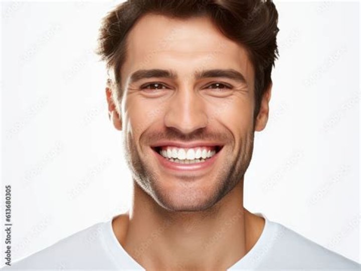 Smiling Handsome Man: The Charismatic Allure of a Charming Smile